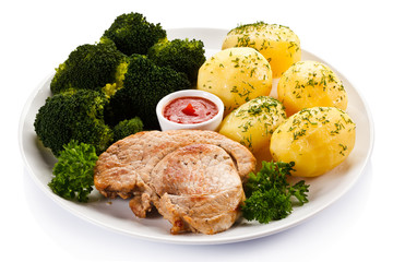 Steak, boiled potatoes and vegetables 