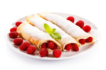 Crepes with raspberries and cream 