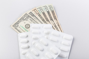 Tabletten und Geld