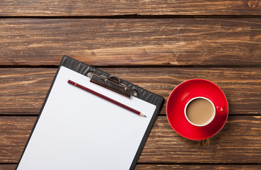 Cup of coffee latte and business tablet