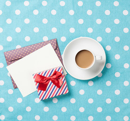 Cup of coffee and envelope