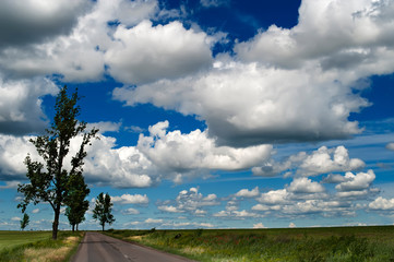 Countryside Landscape With Blue Cloudy Sky