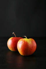 Apples on black background