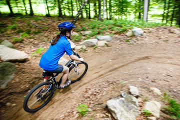 Healthy lifestyle - teenage girl cycling 