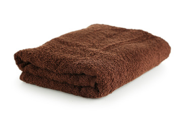 Fototapeta na wymiar Brown towel isolated on white