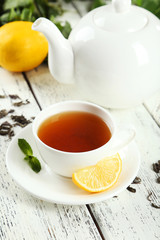 Green tea in cup and teapot 