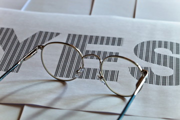 glasses and printed text