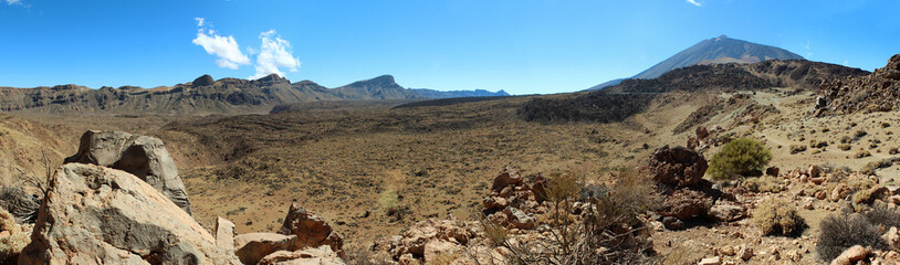 desert landscape, rocks , sand and blue sky,