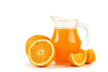 Glass of fresh orange juice on wooden background