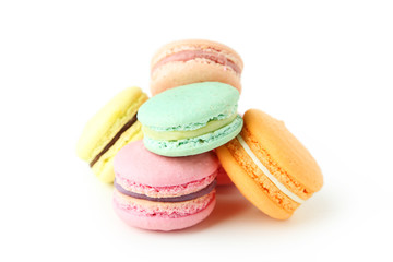 French colorful macarons isolated on white