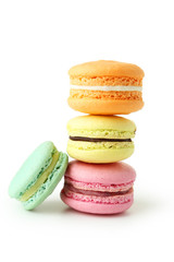 French colorful macarons isolated on white