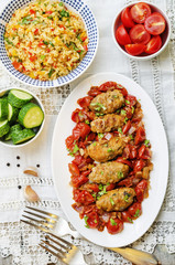 meat sausages with tomatoes