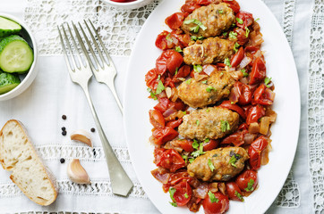 meat sausages with tomatoes