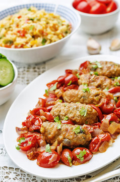 meat sausages with tomatoes