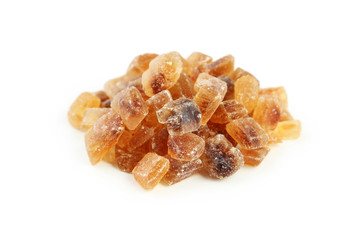 Brown sugar in spoon and bowl on wooden background