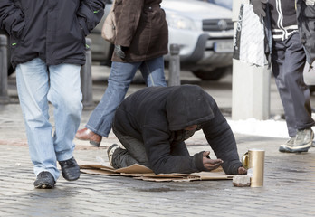 Homeless beggar begging