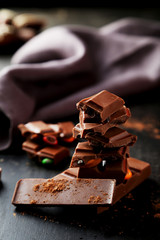 Chocolate plates tower on black background