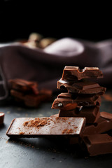 Chocolate plates tower on black background