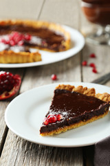 Homemade chocolate tart with pomegranate 