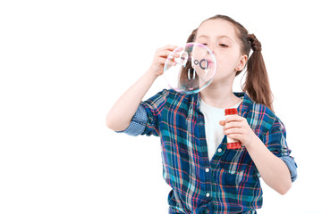 Children playing with bubble blower