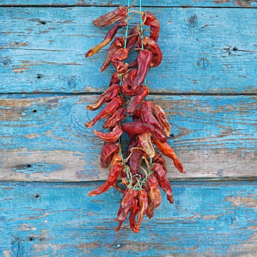 Dried Red Chili Peppers On A Wall