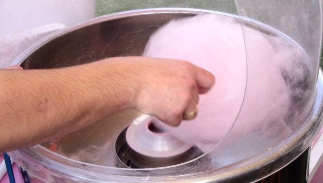 Making cotton candy or candy floss
