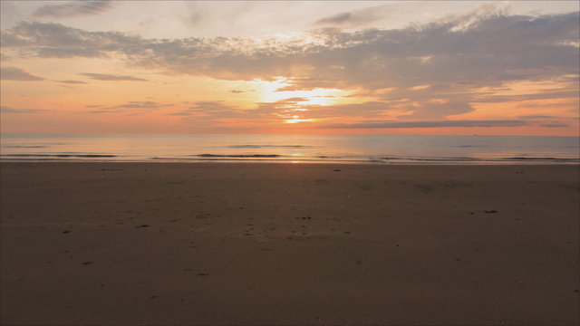 Time lapse ,of orange sunrise over the sea in morning