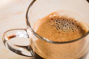 cup of fresh espresso on table