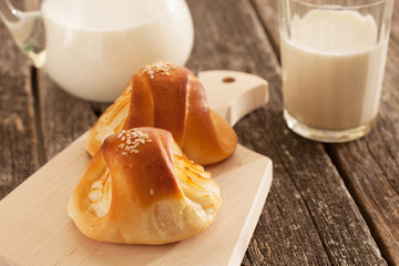 bun with cheese sesame and milk