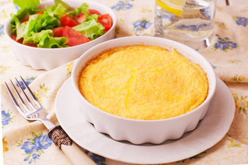 scrambled eggs and salad with fresh vegetables