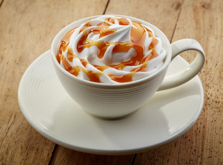 cup of caramel cappuccino coffee