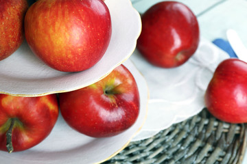 Tasty ripe apples on serving tray on table close up