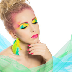 Portrait of beautiful blonde woman. Vivid colored summer make-up