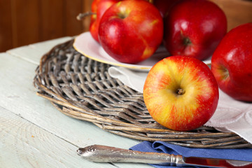 Tasty ripe apples on table close up