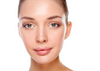 Fototapeta premium Close up portrait of beautiful young woman face. Isolated on