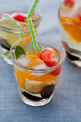 Refreshing white sangria (punch) with fruits, picnic idea
