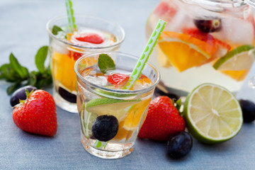 Refreshing white sangria (punch) with fruits, picnic idea