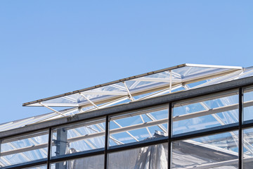 open glass ventilation windows on a conservatory roof