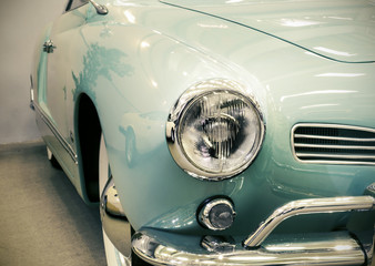 Detail on the headlight of a vintage car