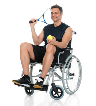 Disabled Man Holding Racket And Ball