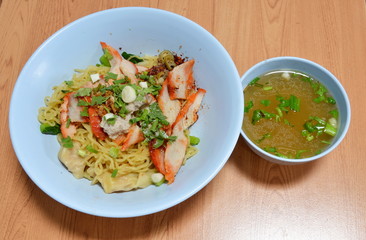 Chinese noodle topping barbecue pork and soup