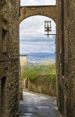 Street with arch, San Gimignano, Italy