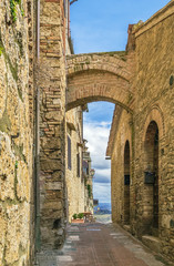Street with arch, San Gimignano, Italy
