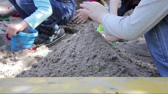 Sandbox children play