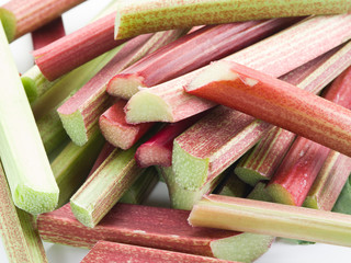 Rhubarb stalks on the white background.