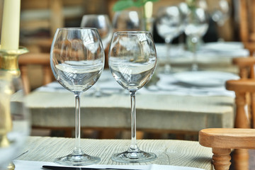 Table setting with wine glasses at the vintage cafe.