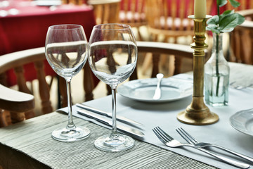 Table setting with wine glasses at the vintage cafe.