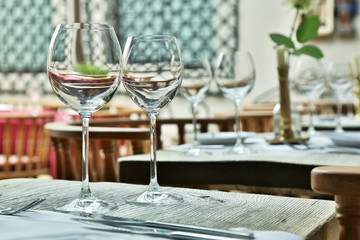 Table setting with wine glasses at the vintage cafe.