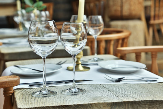 Table setting with wine glasses at the vintage cafe.