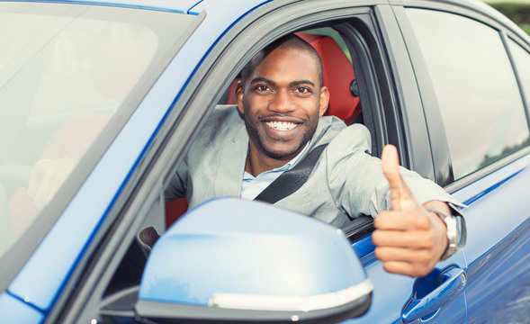 Man Driver Happy Showing Thumbs Up Coming Out Of Car